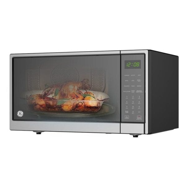 Un Horno Microondas con Air Fryer de 31 Litros Inox Espejo GE - MGE11XAF con un pavo en su interior. Un Horno Microondas con Air Fryer de 31 Litros Inox Espejo GE - MGE11XAF con un pavo en su interior.