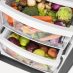 Un Nevecón No Frost 615 Lts. Brutos Inoxidable GE Profile - PQL22LEKFSS refrigerador lleno de frutas y verduras frescas.