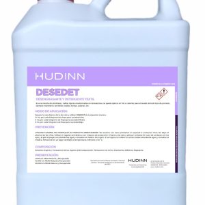 Un recipiente de plástico blanco con la etiqueta "HUDINN DESEDET" con una etiqueta morada y blanca que detalla el uso, aplicación, composición y precauciones en español. El contenedor AUTO-DRAFT tiene un asa incorporada para facilitar su transporte.